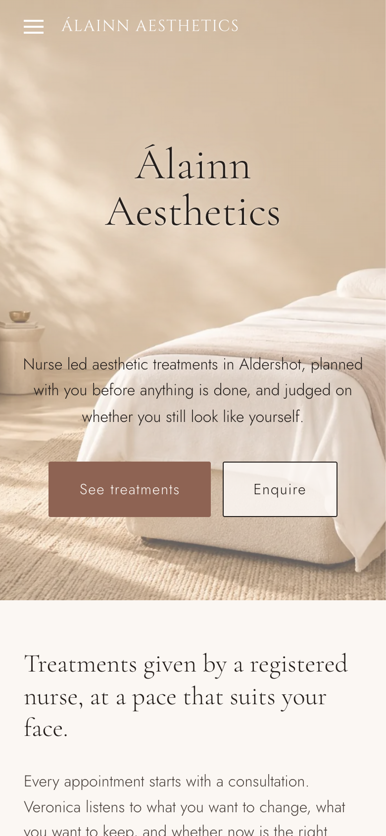 Álainn Aesthetics homepage on a phone, with the brand wordmark over the treatment room photograph and the treatments section below